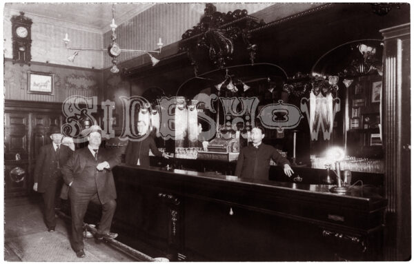 large man at bar saloon vintage photo