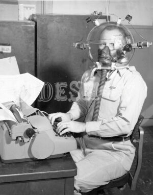 uniformed typist gas mask